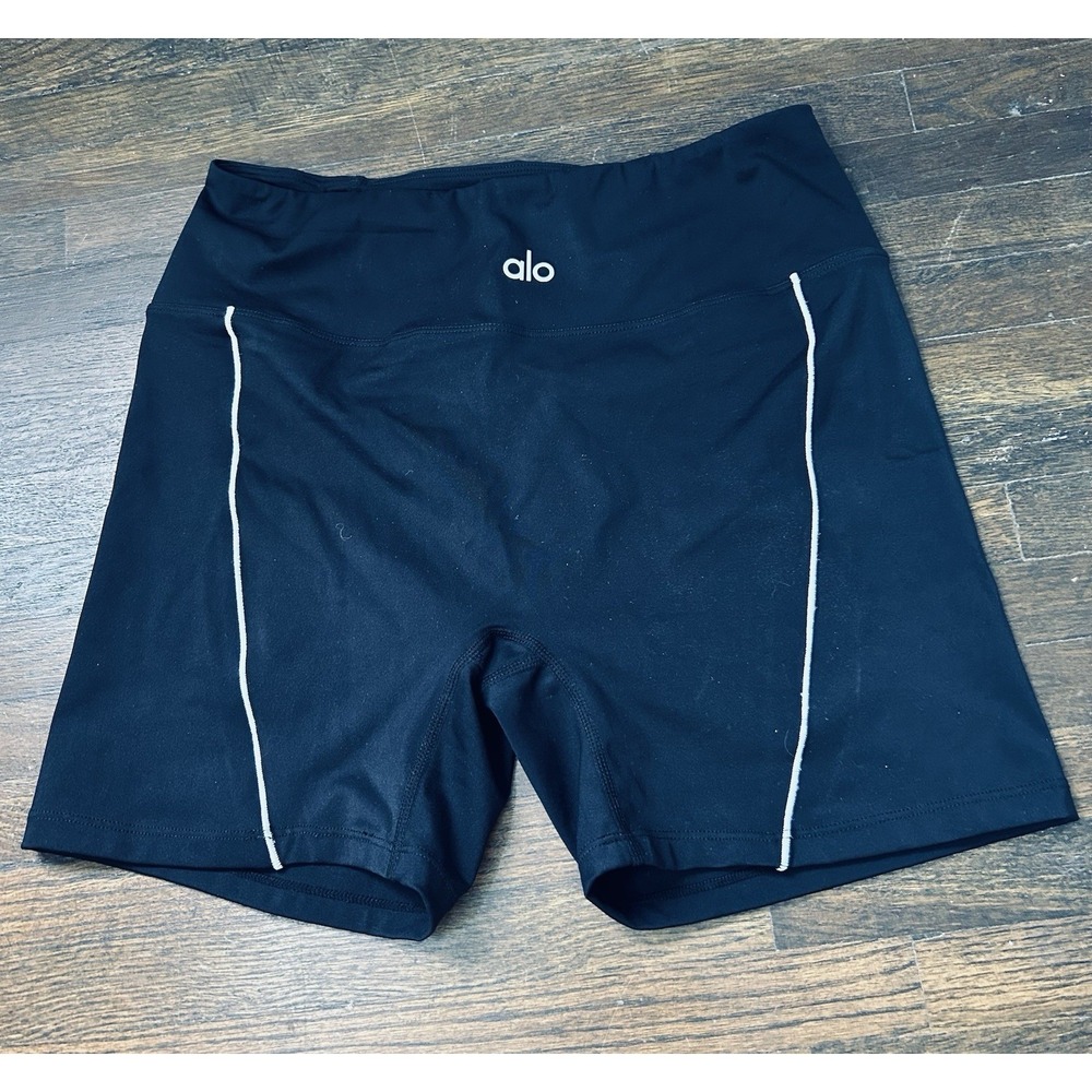 Alo Yoga black biker shorts featuring contrasting white piping down the sides S
